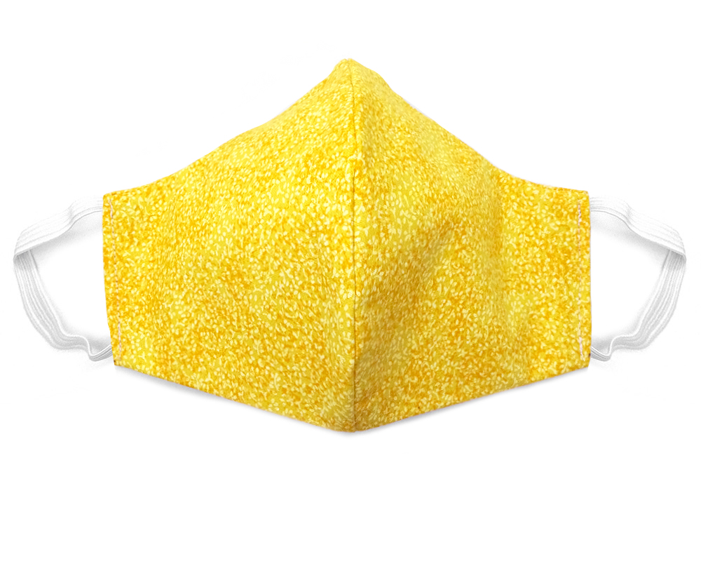 Handmade leaf nature print fabric face mask with 100% cotton and elastic straps in yellow adult size.