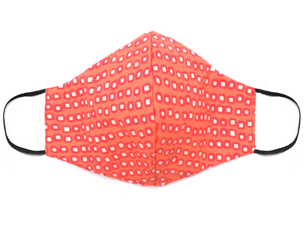 Handmade square pattern print fabric face mask with 100% cotton and elastic straps in peach, salmon pink, and white adult size.