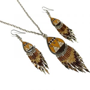 Handmade teardrop-shaped ceramic chain necklace and matching earrings with handpainted tribal pattern design and long seed bead and alpaca silver metal dangles in tan, brown, and beige color combination.
