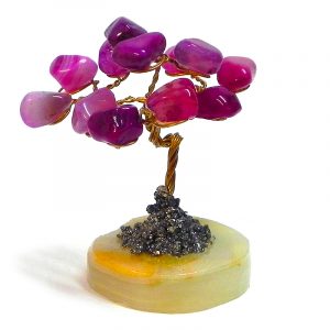 Handmade golden-colored metal wire and tumbled hot pink agate gemstone crystal tree of life table ornament with crushed pyrite and a round stone base.