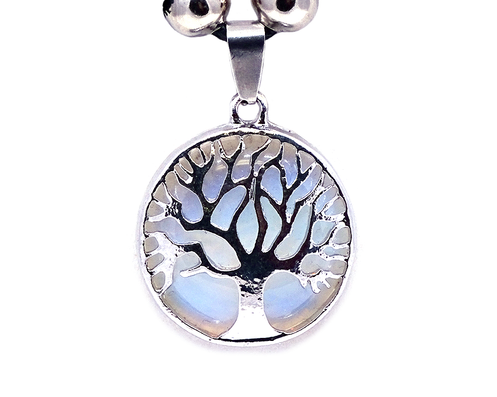 Handmade round-shaped gemstone cabochon crystal pendant with silver metal tree of life design on adjustable necklace in iridescent white opalite.
