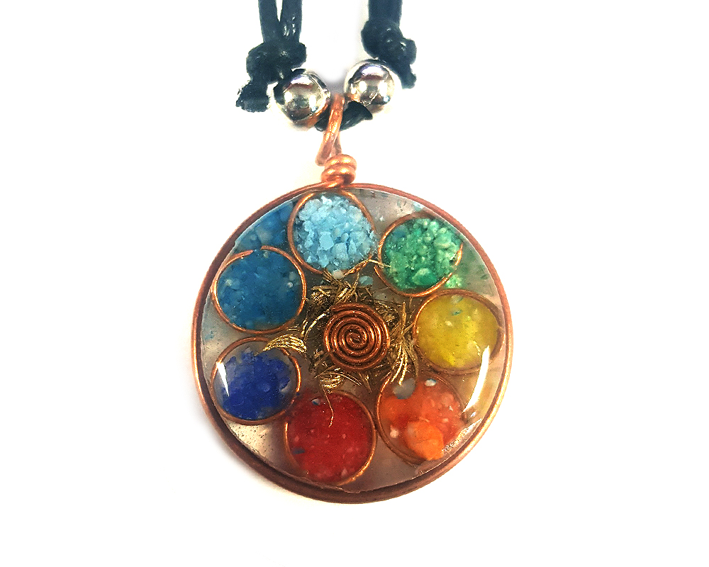 Round-shaped acrylic resin, copper metal wire, and crushed chip stone inlay orgonite pendant with 7 chakra rainbow circle pattern on adjustable necklace.