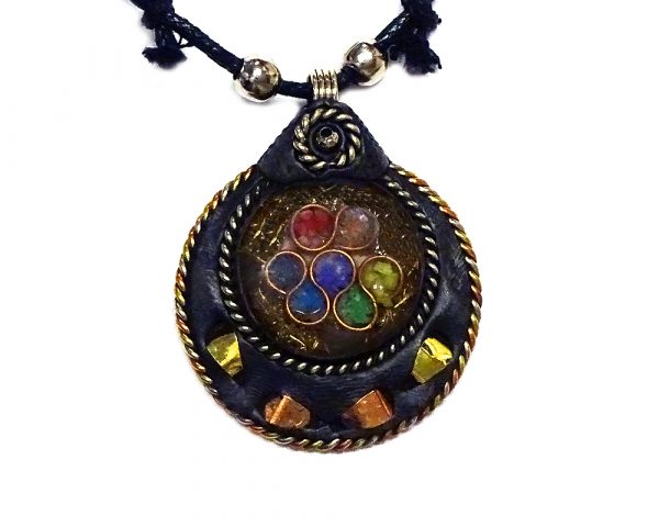 Round-shaped acrylic resin, copper metal wire, and crushed chip stone inlay orgonite pendant with 7 chakra rainbow circle pattern and black resin border on adjustable necklace.