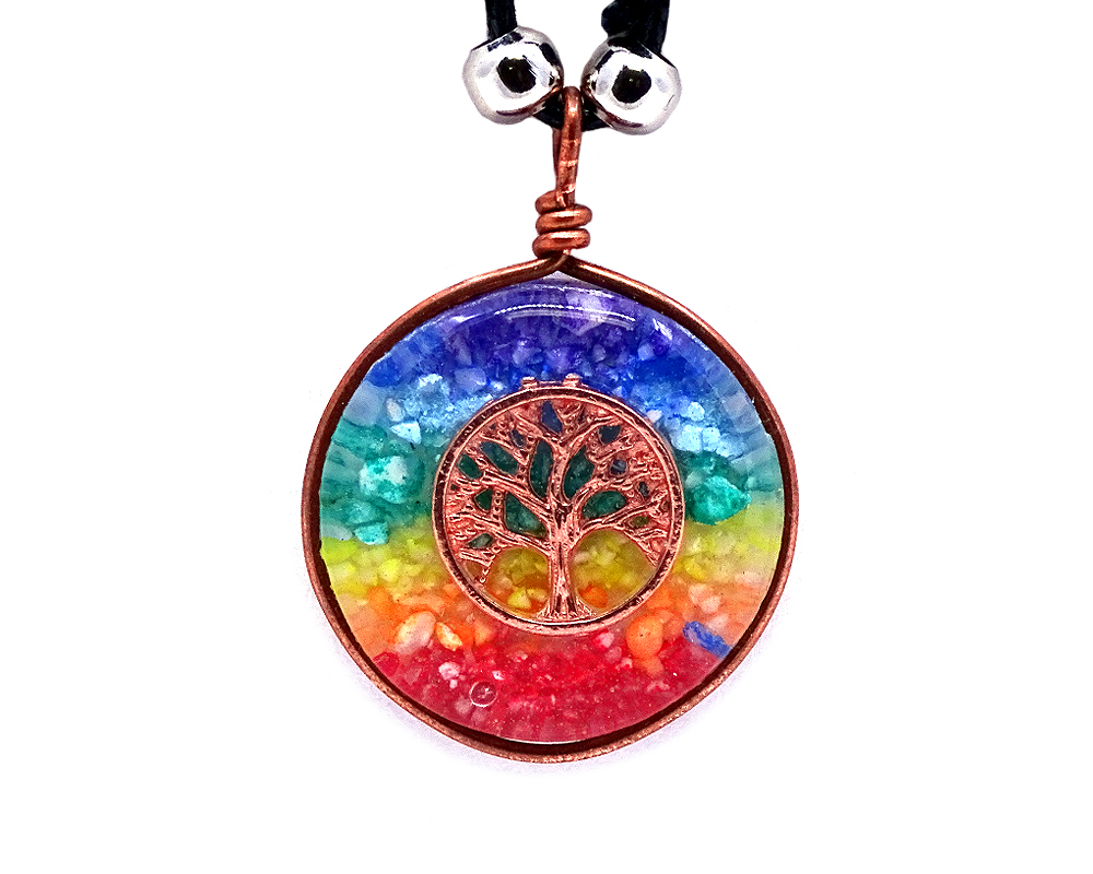 Round-shaped acrylic resin and crushed chip stone inlay orgonite pendant with 7 chakra rainbow striped pattern and copper metal tree of life charm on adjustable necklace.