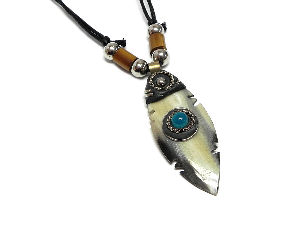 Surfboard shaped natural bull horn pendant with blue bead on adjustable necklace.