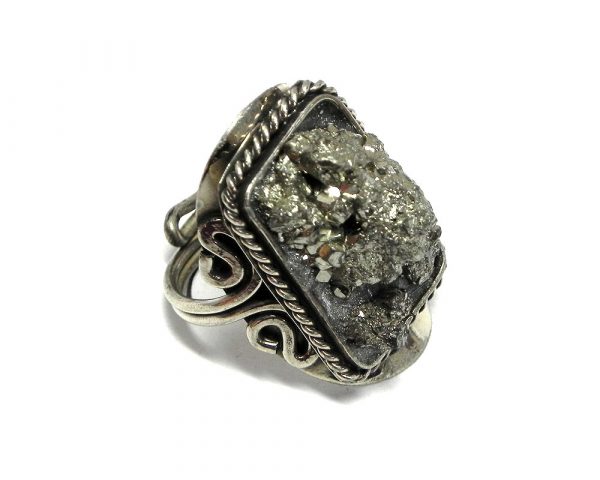 Rectangle-shaped rough-cut raw gemstone on adjustable alpaca silver metal ring with rope edge border in silver pyrite.