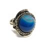 Handmade round-shaped dyed agate marble gemstone cabochon on adjustable alpaca silver metal ring with rope edge border in turquoise color.