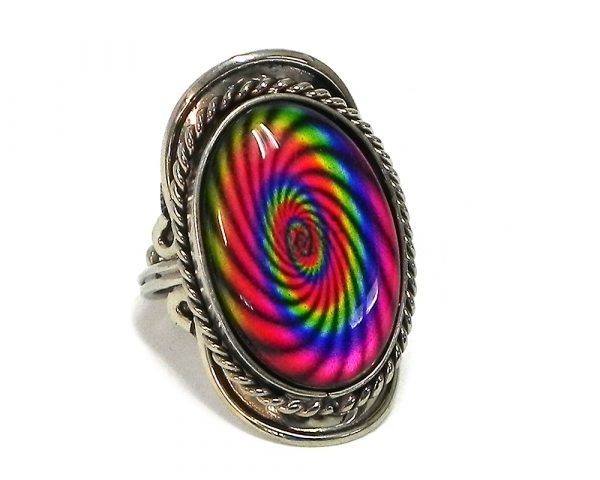 Handmade oval-shaped acrylic New Age themed psychedelic spiral graphic design on alpaca silver metal ring with rope edge border in rainbow color combination.