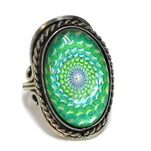 Handmade oval-shaped acrylic New Age themed mandala graphic design on alpaca silver metal ring with rope edge border in lime green, turquoise, mint, and white color combination.