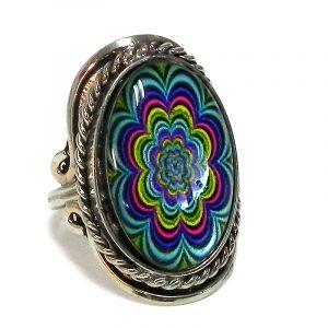 Handmade oval-shaped acrylic New Age themed psychedelic floral mandala graphic design on alpaca silver metal ring with rope edge border in turquoise, blue, hot pink, yellow, and black color combination.