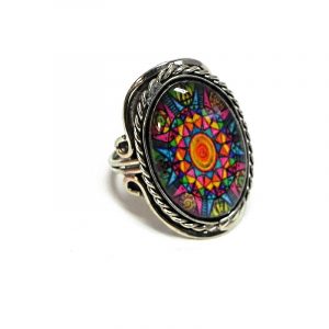 Handmade oval-shaped acrylic New Age themed psychedelic mandala graphic design on alpaca silver metal ring with rope edge border in multicolored color combination.