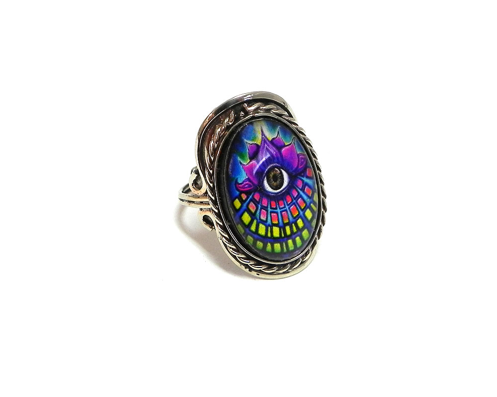 Handmade oval-shaped acrylic New Age themed third eye lotus graphic design on alpaca silver metal ring with rope edge border in purple and multicolored color combination.