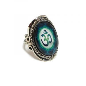 Handmade oval-shaped acrylic New Age themed om sign graphic design on alpaca silver metal ring with rope edge border in teal green, green, and white color combination.