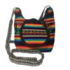 Small crossbody purse bag with tribal print striped pattern material (or manta Inca), vegan leather base, and outer flap pocket in rainbow colors.