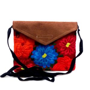 Handmade mini floral envelope purse bag with tan vegan leather suede, embroidered cotton, hook-and-loop fastener and zipper closure, and strap with red fabric.