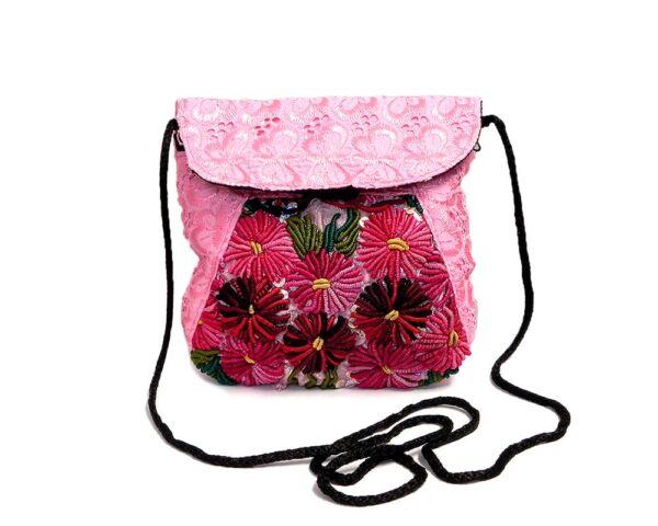 Handmade small floral purse bag with satin material, multicolored embroidered cotton, hook-and-loop-fastener and zipper closure, and strap in pink.