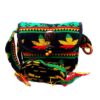 Handmade small cushioned half moon purse bag with multicolored tribal print striped pattern, pot leaf design, fringe, and coconut button and beads in Rasta colors.