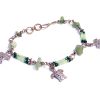 Handmade seed bead and chip stone alpaca silver metal chain bracelet with three sea turtle charm dangles in green and light green color combination.