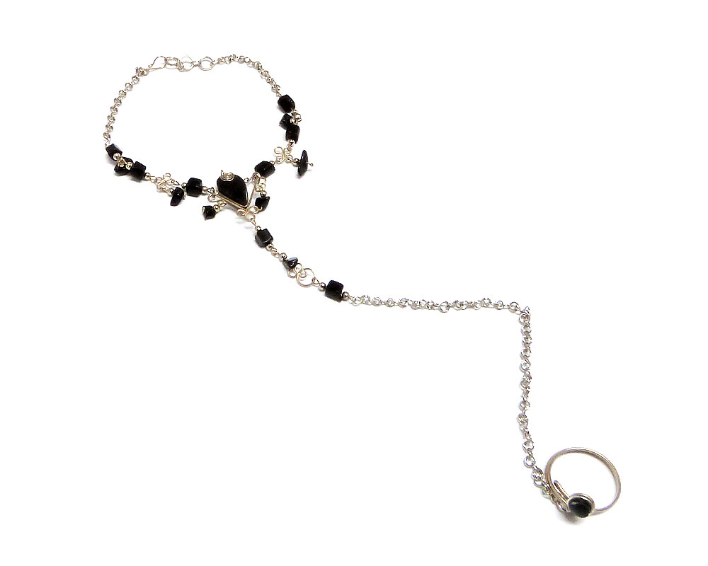 Handmade alpaca silver metal chain harem anklet with teardrop-cut stone and chip stone dangles, linked to mini round-shaped stone toe ring in black onyx.