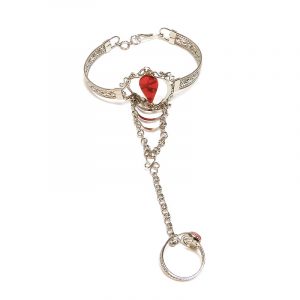 Handmade alpaca silver metal cuff harem bracelet with teardrop-cut gemstone crystal cabochon centerpiece, chain linked to mini ring in red howlite.