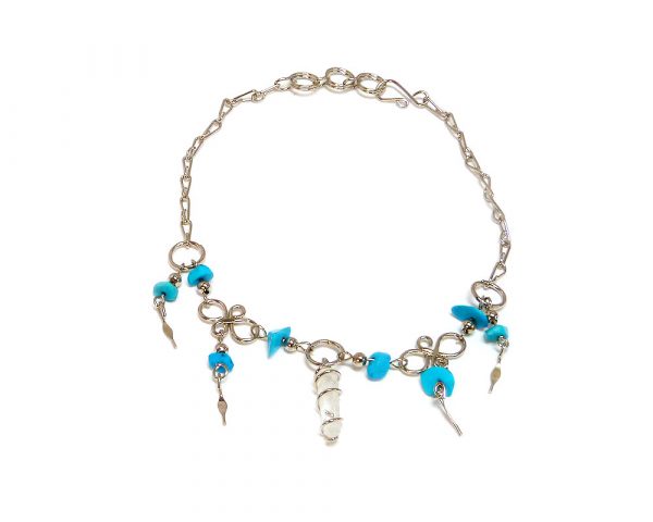 Handmade alpaca silver metal chain anklet with wire wrapped natural clear quartz crystal, chip stones, and metal dangles in turquoise color.