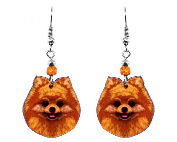 Mia Jewel Shop: Pomeranian dog face acrylic dangle earrings with beaded metal hooks in orange, tan, and black color combination.