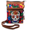 Medium-sized slim rectangular brown vegan leather purse bag with cotton embroidered Day of the Dead sugar skull and floral designs in black and multicolored color combination.