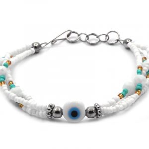 Seed bead and crystal bead multi strand bracelet with evil eye bead centerpiece in white, light blue, black, gold, and mint color combination.