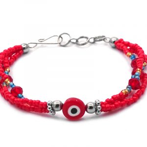 Seed bead and crystal bead multi strand bracelet with evil eye bead centerpiece in red, white, black, gold, and turquoise blue color combination.