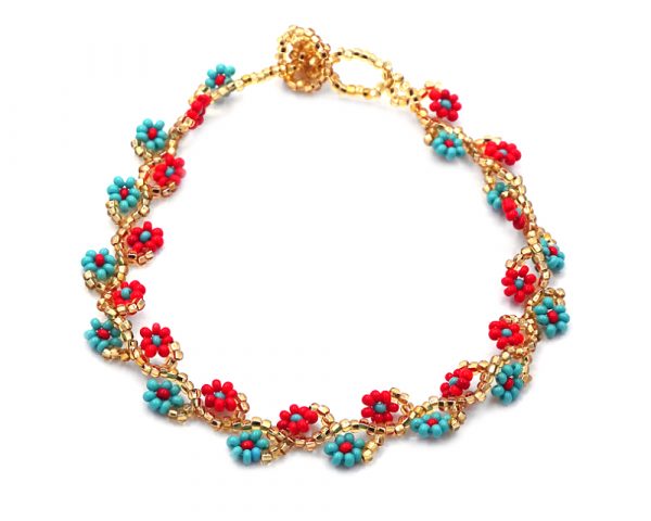 Handmade Czech glass seed bead floral vine anklet with beaded flowers in gold, red, and turquoise mint color combination.