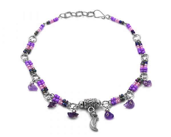 Handmade seed bead silver metal chain anklet with metal crescent half moon charm and chip stone dangles in purple, light pink, and iridescent color combination.