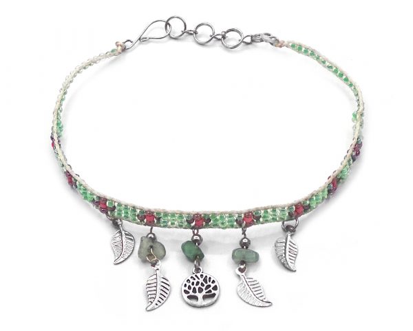 Handmade floral seed bead strap anklet with chip stones, silver metal tree of life charm, and leaf charm dangles in light green, salmon pink, and rose gold color combination.