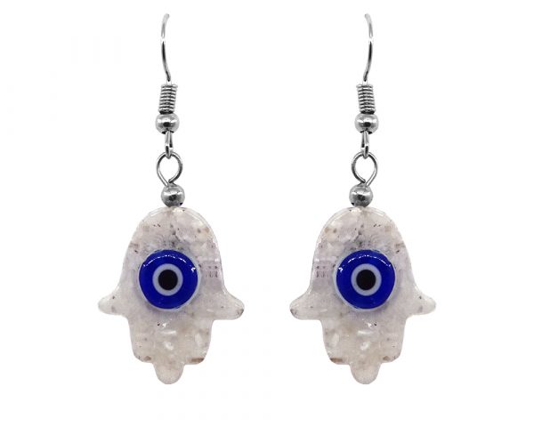 Handmade hamsa hand shaped acrylic resin and crushed chip stone inlay dangle earrings with blue and white evil eye bead in white color.