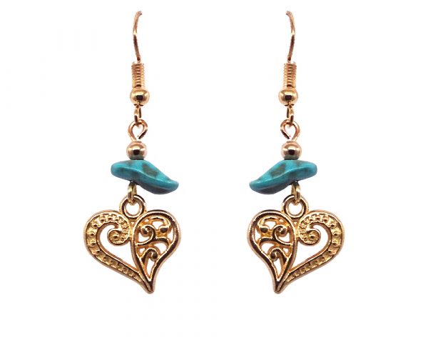 Handmade gold-colored heart charm dangle earrings with turquoise howlite chip stone.