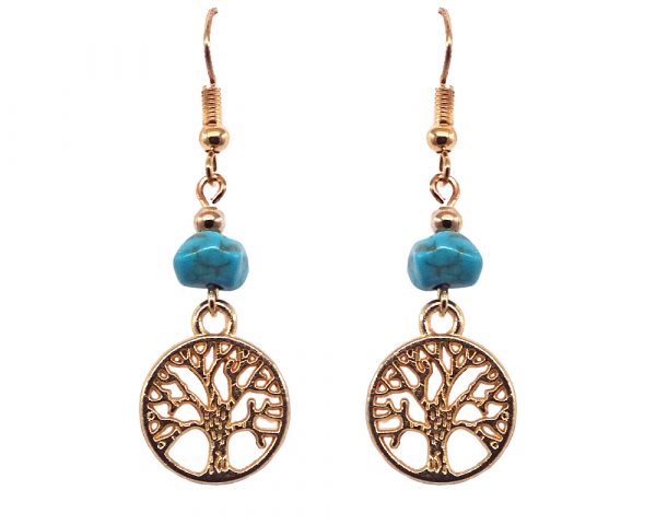 Handmade gold-colored tree of life charm dangle earrings with turquoise howlite chip stone.