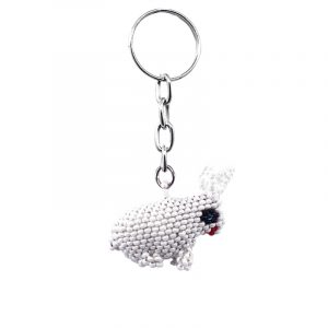 Handmade Czech glass seed bead figurine keychain of a white bunny rabbit in white, black, and red color combination.