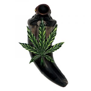 Handcrafted tobacco smoking natural bullhorn hand pipe of a cannabis pot leaf in green color.