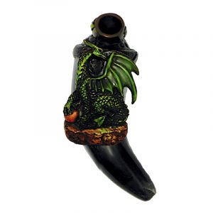 Handcrafted tobacco smoking natural bullhorn hand pipe of a green dragon holding a stone.