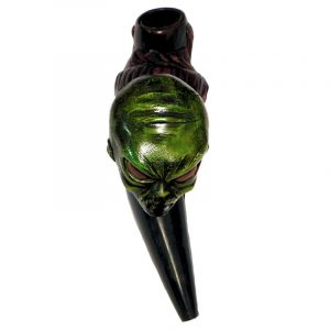 Handcrafted tobacco smoking natural bullhorn hand pipe of a green alien head.