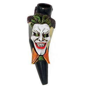 Handcrafted tobacco smoking natural bullhorn hand pipe of an evil clown character with a big head, creepy smile, green hair, and suit.