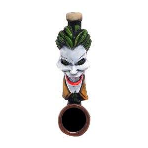 Handcrafted tobacco smoking hand pipe of an evil clown character with a big head, creepy smile, green hair, and suit in mini size.