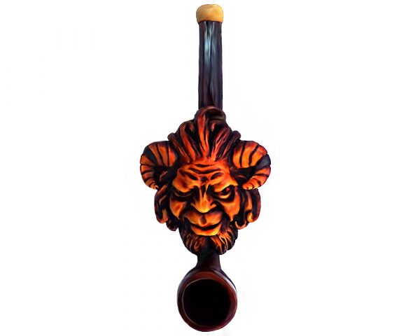 Handcrafted tobacco smoking hand pipe of an evil goat man head representing the Greek mythology god of the wild, Pan, in small size.