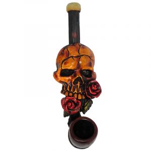 Handcrafted tobacco smoking hand pipe of a beige skull with red roses in its mouth in small size.