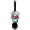 Handcrafted tobacco smoking hand pipe of a white Day of the Dead sugar skull with multicolored floral designs in small size.