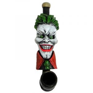 Handcrafted tobacco smoking hand pipe of an evil clown character with a big head, creepy smile, green hair, and suit in small size.