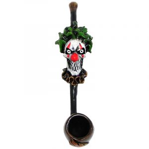 Handcrafted tobacco smoking hand pipe of an evil clown head with a creepy smile and red nose in small size.