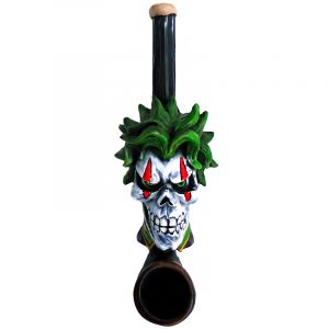 Handcrafted tobacco smoking hand pipe of an evil clown skull with green hair and tie in small size.