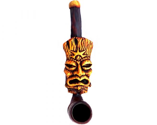 Handcrafted tobacco smoking hand pipe of a tiki head mask with a rising sun design in small size.