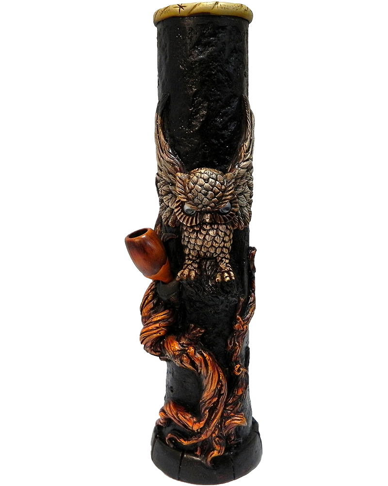 Handcrafted tobacco smoking water pipe of a brown owl with open wings over a brown tree.