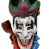 Handcrafted tobacco smoking water pipe of an evil mad jester head with a creepy smile and a red, blue, and green suit.